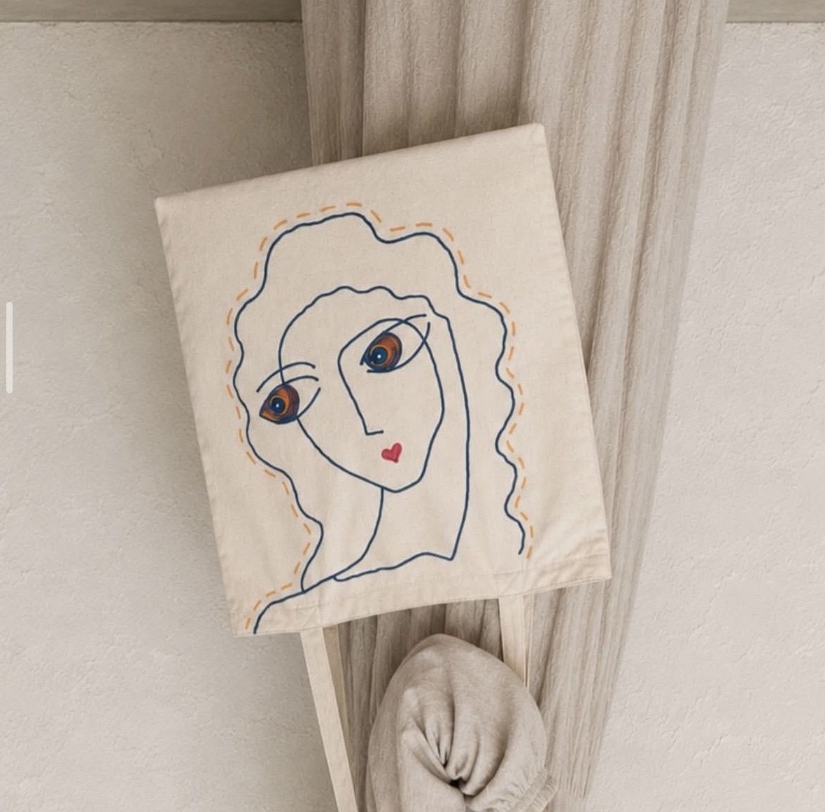 The Muse — the painted face shown upright